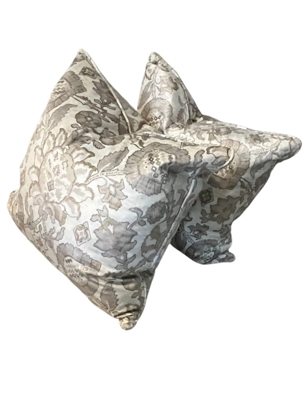 Decorative throw pillow showcasing a floral damask pattern in neutral tones